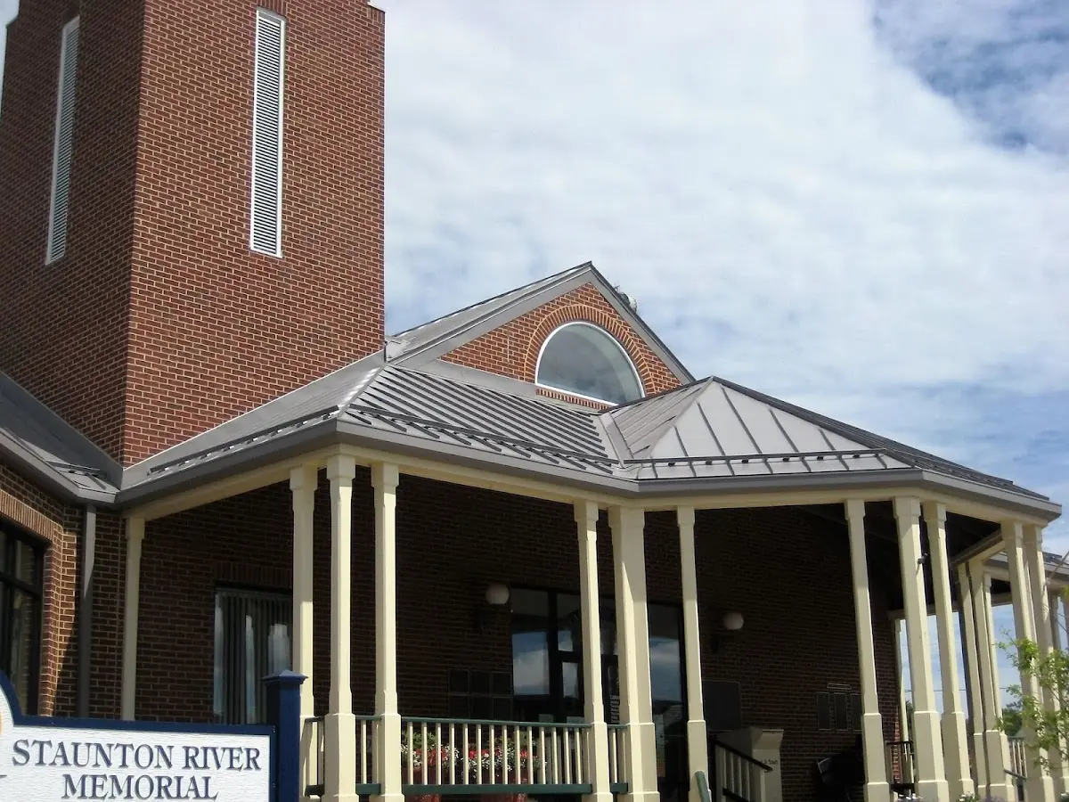 Skilled roofing craftsmen working on a residential roof in Chaffeeville